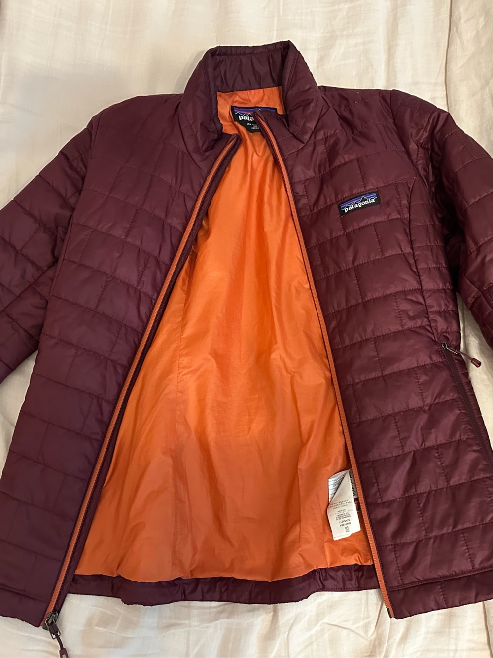 Patagonia Women's Quilted Puffer Jacket in Burgundy with Orange Lining